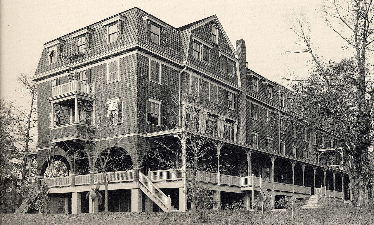 Historical multi story wooden building representing resilience and historical case studies for rock bottom quotes